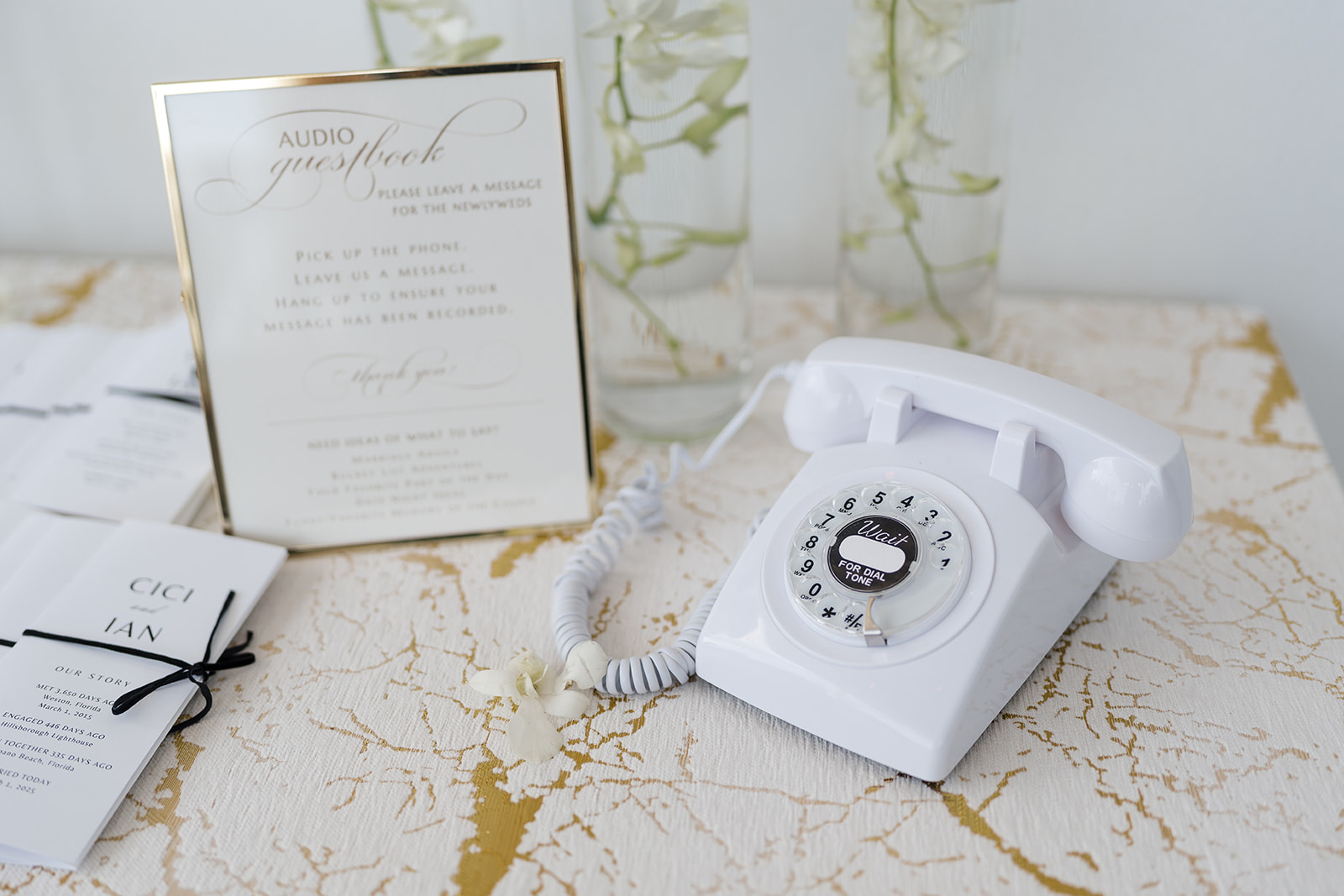 Classic white vintage rotary audio guestbook phone setup